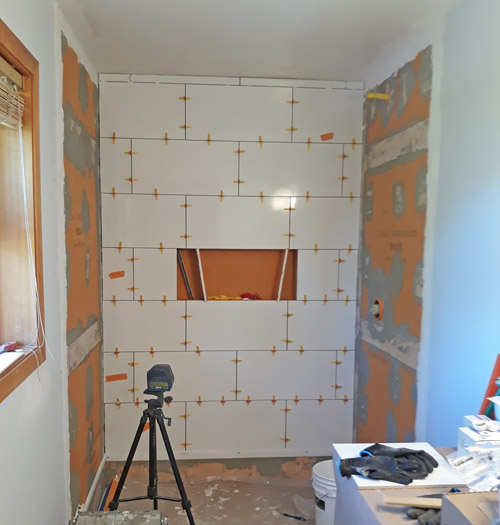 Tile going up © Colehauscats.com